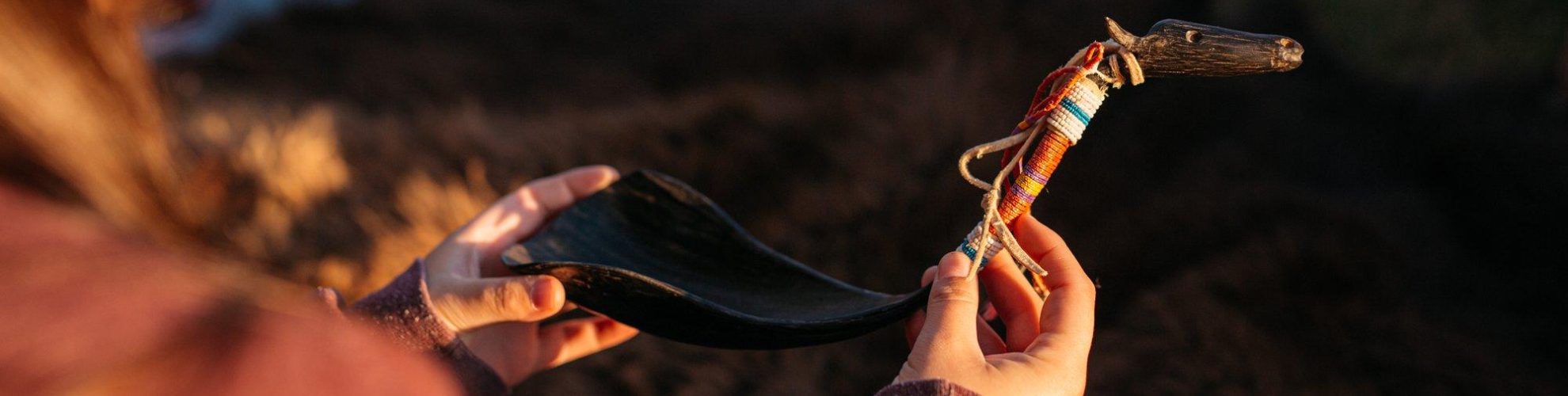 Indigenous hand-carved ladle with bison head and decorative beaded handle
